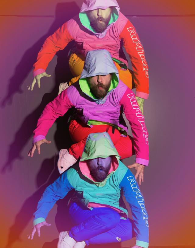 an image of a dancer wearing eclectic colors and duplicated three times in a static pose full of vibrant neon colors